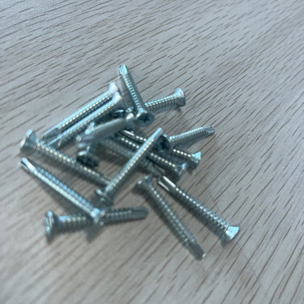 สกรูเกลียวปล่อยสกรู สแตนเลส ตะปู ตะปูตอก Flat Head Self Drilling Screw 1กล่อง500G มีประมาณ 200-300 ชิ้น พร้อมส่งในไทย